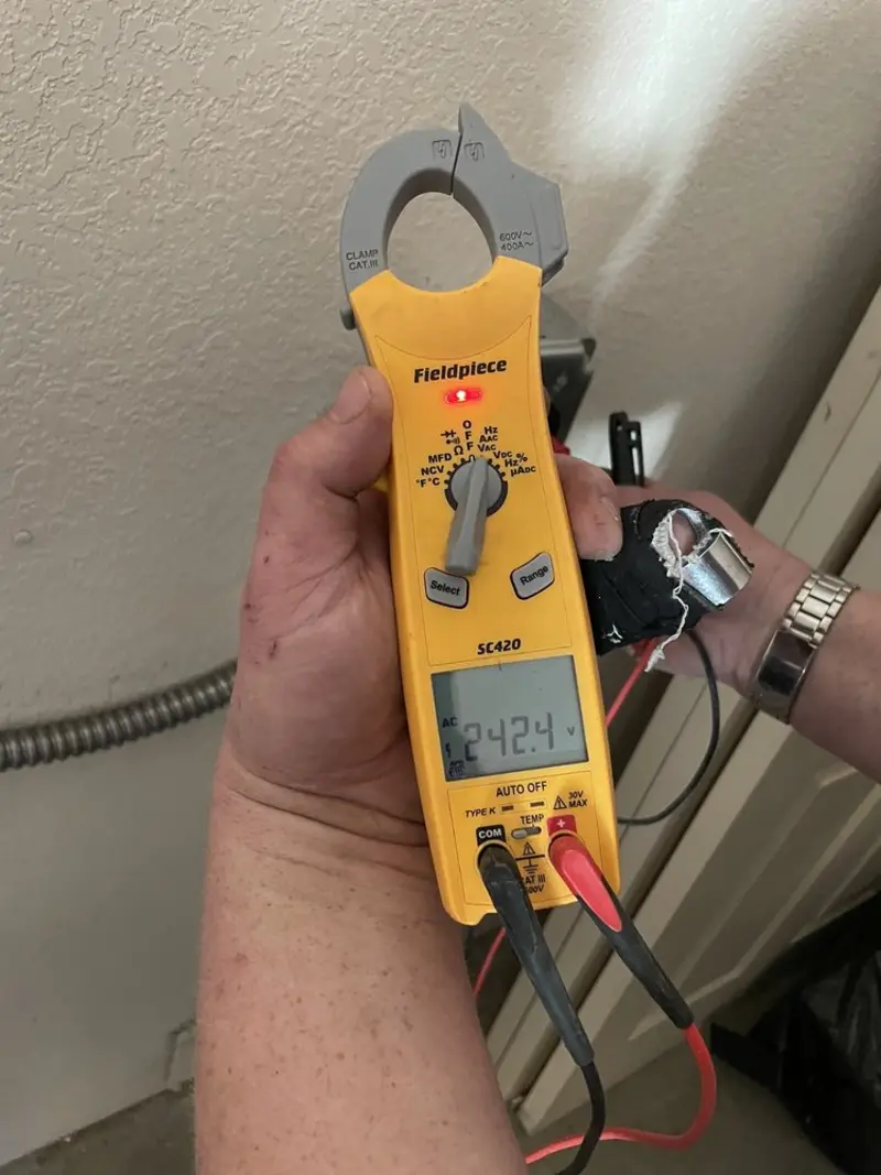 Voltage testing with clamp meter during Generator Installation in Farmville